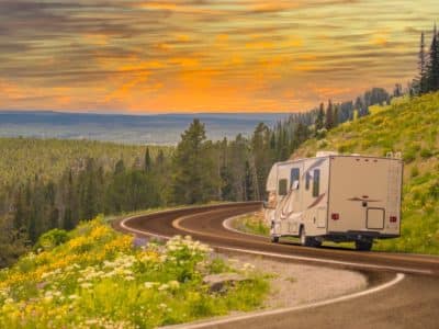 camper-driving-down-winding-road
