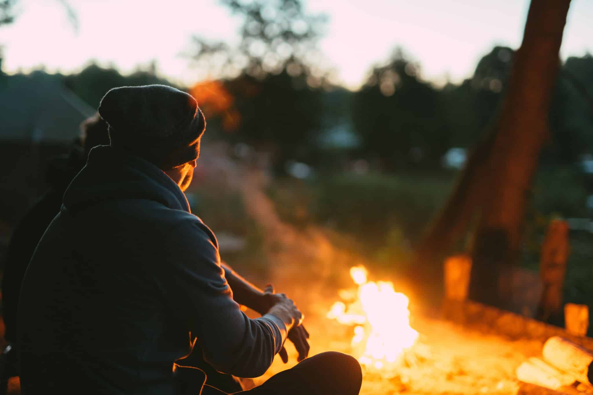 backyard-firepit-guy-relaxing-scaled